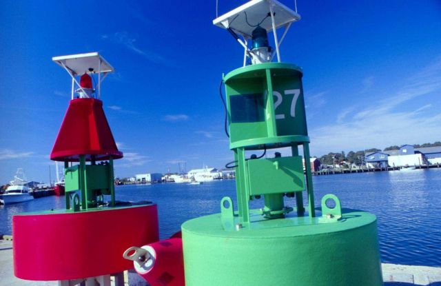 Fishermen depend on navigational aids, such as these buoys that will mark a channel Picture