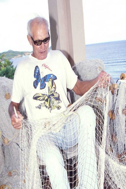 Joe LaPlace mending a net at St Picture