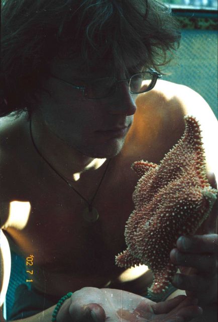 Yuri Zuyev with rare species of starfish (Hippasteria phrygiana phrygiana) Picture