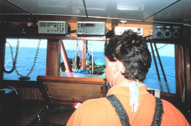 Fishermen on the bridge using acoustic instruments to locate tuna Picture