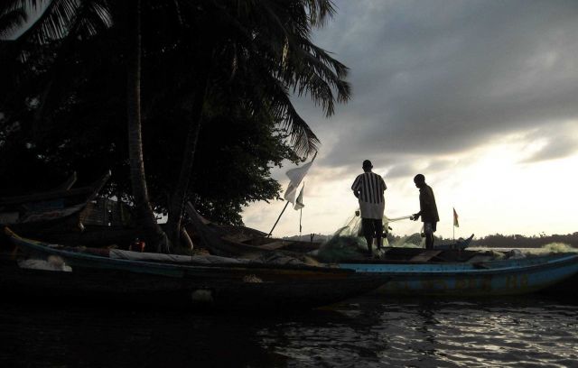 Young fisherman preparing nets Picture
