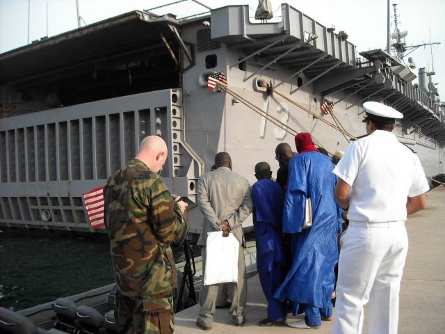 Group of local officials and artisanal fishermen beginning tour of USS NASHVILLE, LPD-13 Picture