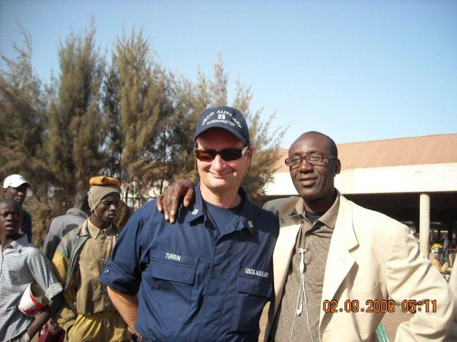 Lieutenant Turrin of the Coast Guard Auxiliary serving as interpreter for the French speaking Senegalese and the NOAA International Affairs sustainabl Picture