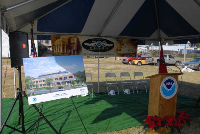 Tent and speakers stand at groundbreaking ceremony of new Pascagoula fisheries laboratory. Picture