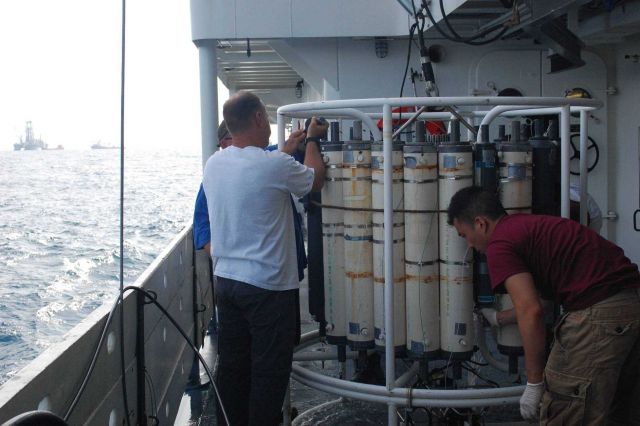 Preparing a CTD rosette for taking measurements and water samples at the Deep Water Horizon oil spill site. Picture