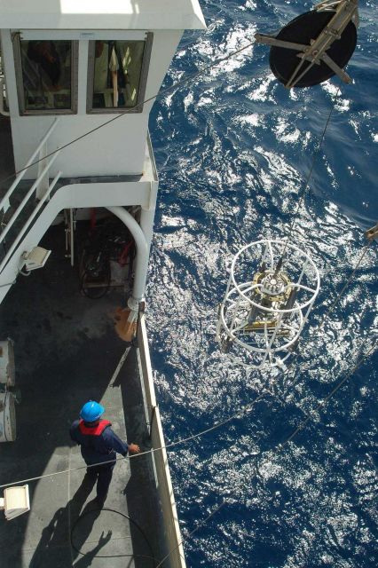 Recovering a CTD rosette with few water sampling bottles. Picture