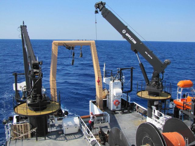 Readying test weight for final oceanographic winch test during sea trials of NOAA Ship PISCES. Picture