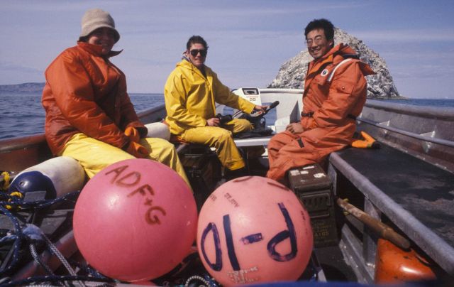 Beth Haley and Kevin Brennan with Allen Shimada approaching offshore rock in Togiak area during offshore herring roe survey. Picture