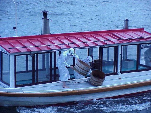 Ama woman dives into the sea for the cultured pearls at Toba Pearl Island Picture