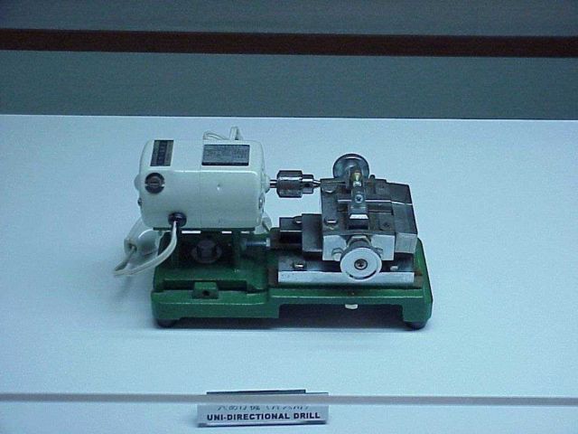 Uni-directional drill used for drilling holes in cultured pearls for stringing. Picture