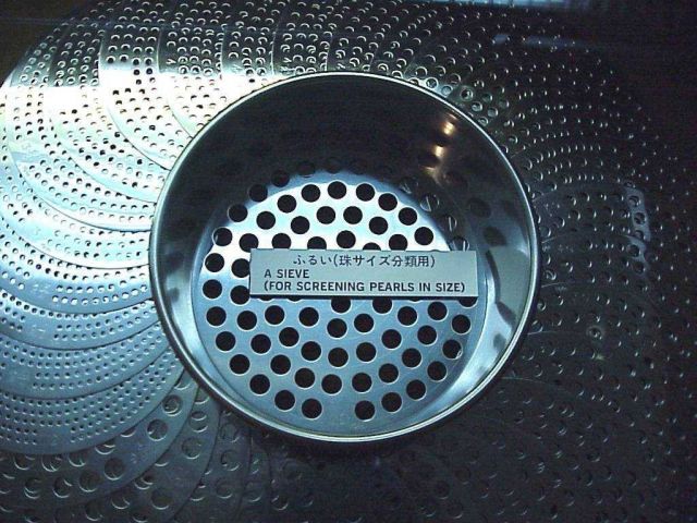 Examples of various sized sieves used in screening pearls for sizing and sorting Picture