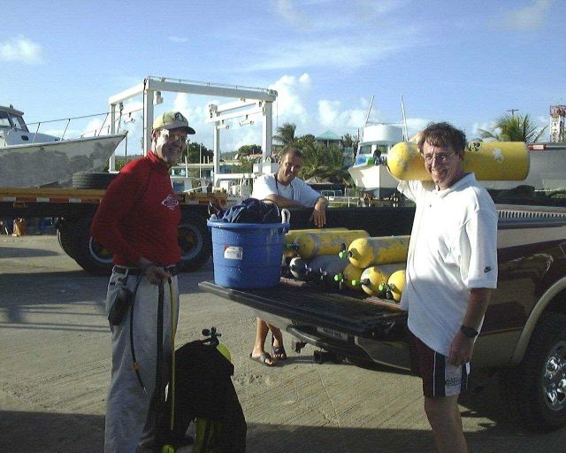 SCUBA tanks being loaded in preparation for work with fish on offshore cage site in Culebra Island, Puerto Rico Picture
