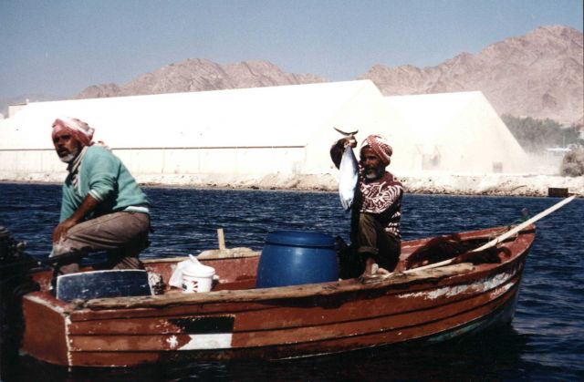 Native fishermen display catch Picture