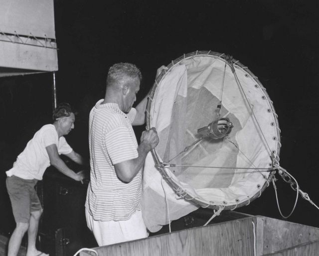 Plankton net being launched at night from the BCF research ship CHARLES H Picture