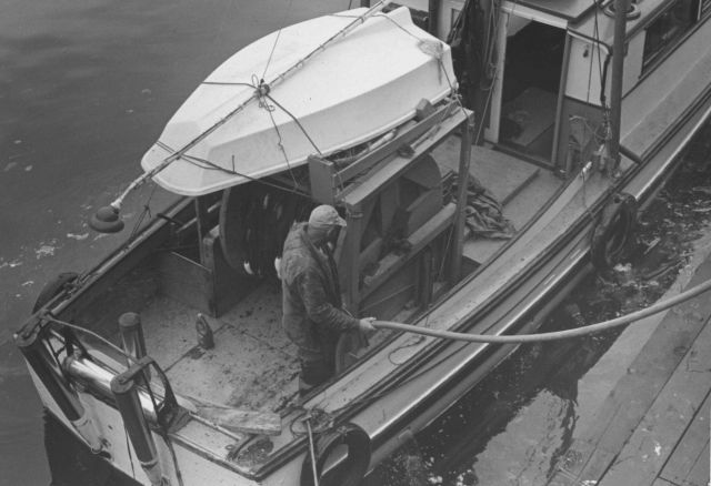 Stern of salmon boat with dinghy Picture