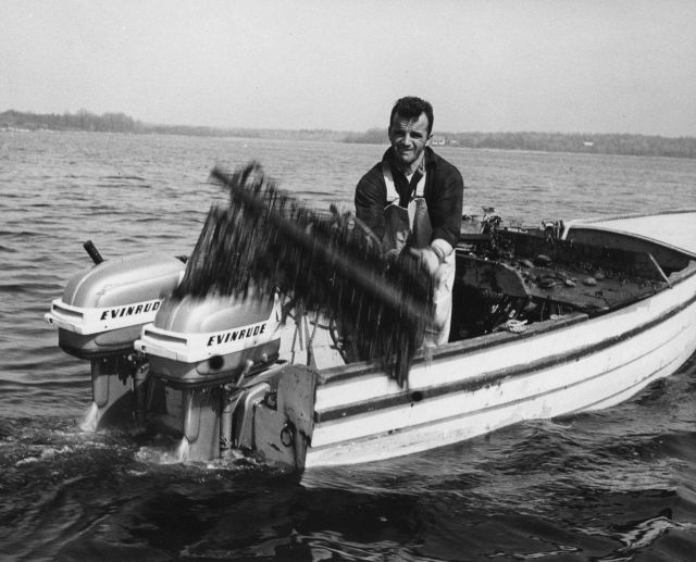 Throwing over the dredge on a one-man scallop and clamming operation Picture