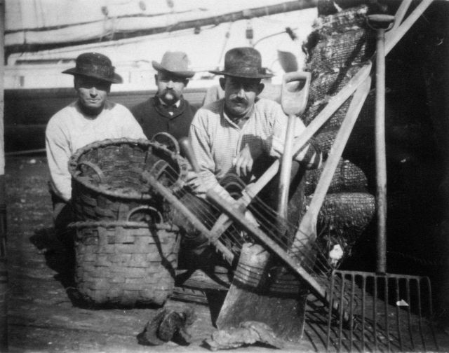 Baskets, shovel, tongs, and pitchfork - the utensils of the oystermen. Picture