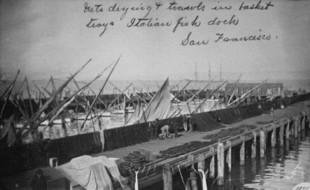 Nets drying and trawls in basket trays, Italian fish dock, San Francisco, CA. Picture