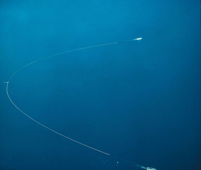 Commercial vessels, under contract to the BCF, skimming dead alewives from the surface of Lake Michigan Picture