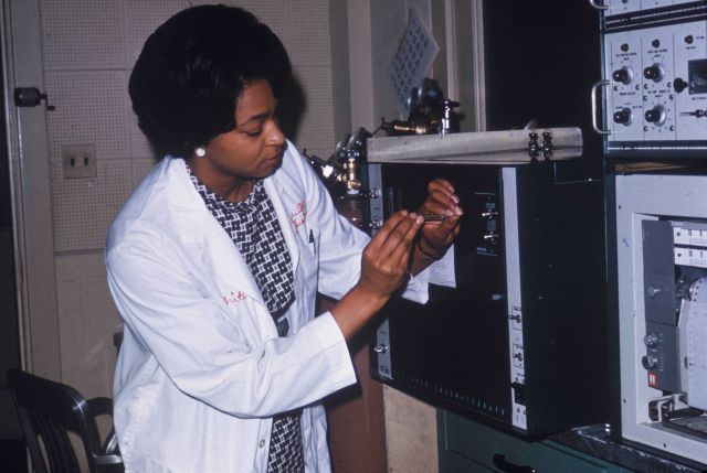 Chemist at BCF College Park Laboratory injecting a sample of fatty acids into a gas chromatograph Picture