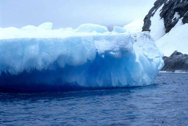 A tabular iceberg, fractured and sculpted by wind and ice. Picture
