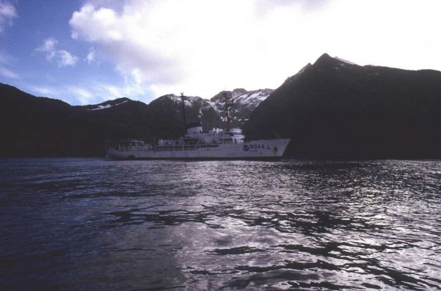 The NOAA ship R/V Surveyor stands before a dramatic landscape in the South Shetland Islands Picture