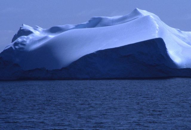 An iceberg sculpted by wind and waves. Picture