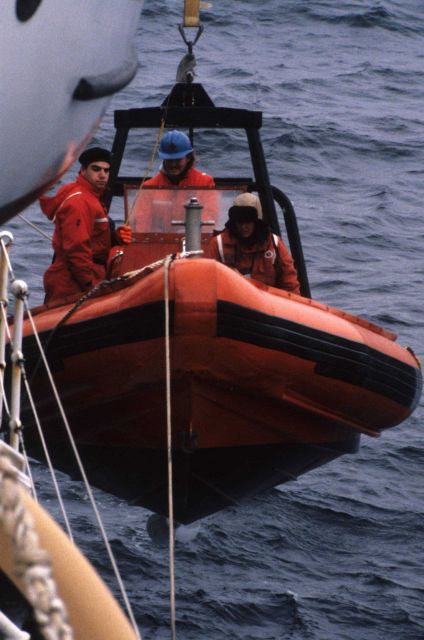 Researchers deploy a small RHIB (Rigid-Hulled Inflatable Boat) from the main research vessel. Picture