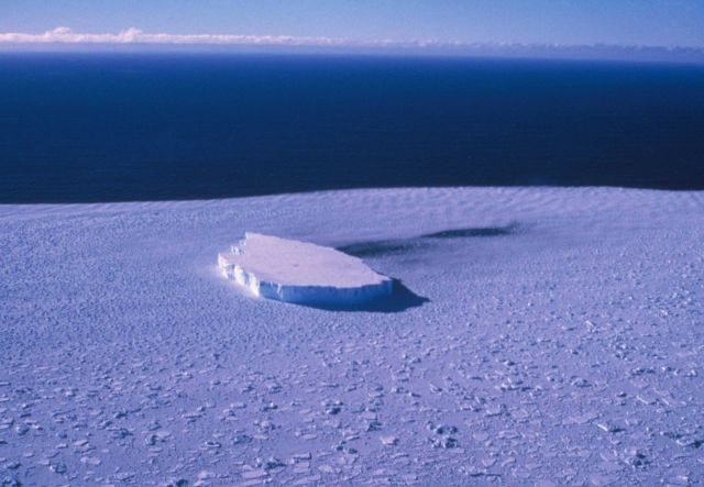 An iceberg in pack ice, Southern Ocean, South Shetland Islands. Picture