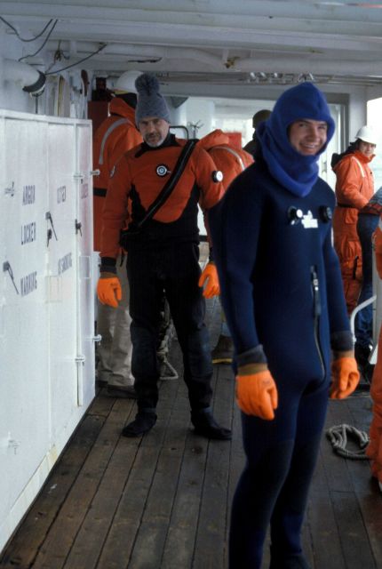 George Watters dons a survival suit for protection from icy Antarctic waters. Picture