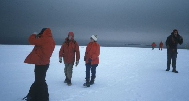 AMLR scientists traverse the snowy landscape, South Shetland Islands. Picture