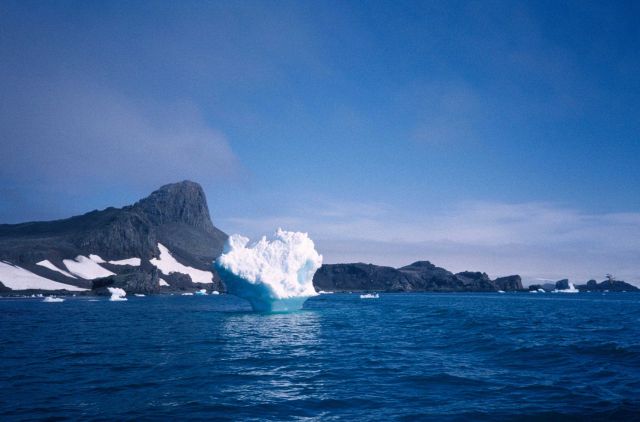 An iceberg with Seal Island in the background. Picture