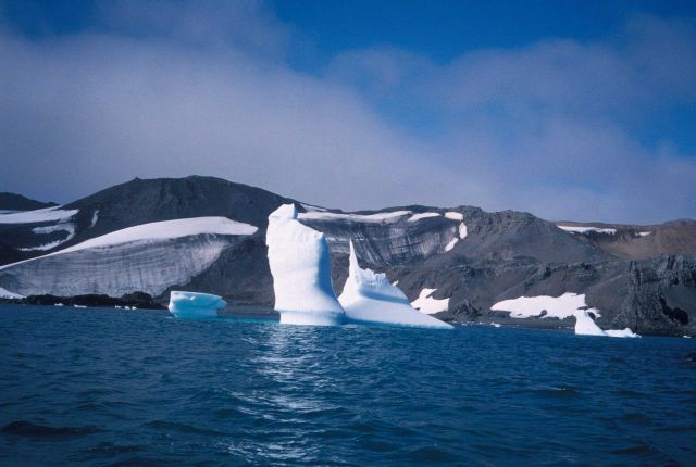 An iceberg with Seal Island in the background. Picture