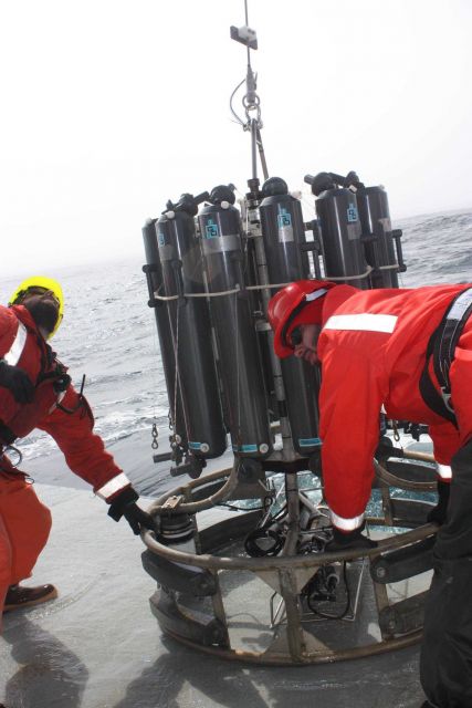 A CTD rosette is deployed to collect water samples. Picture