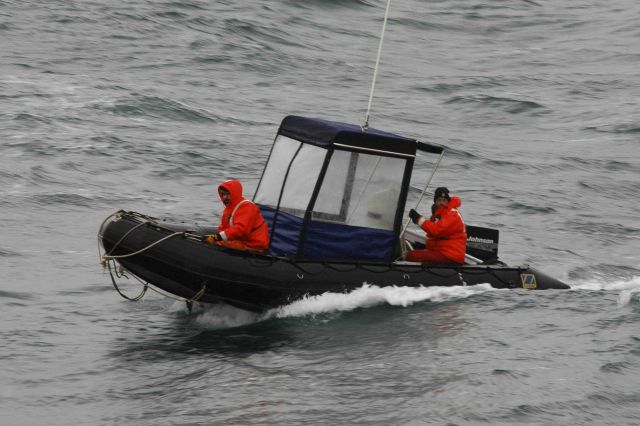 Researchers on a zodiac using multibeam acoustics for krill school measurements. Picture