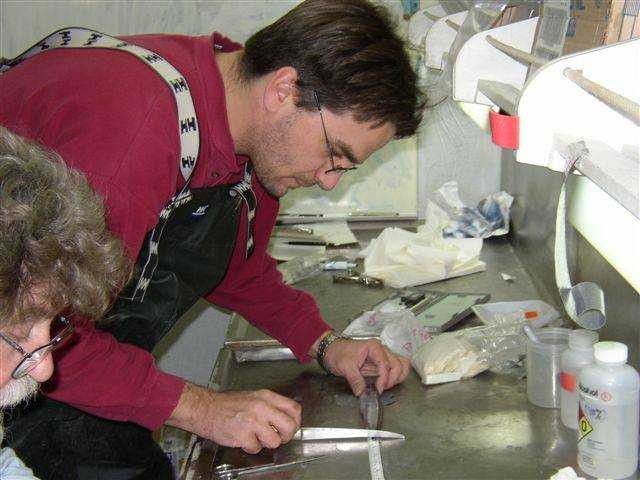 AMLR scientist Tom Near measures fish samples caught aboard the R/V Yuzhmorgeologiya. Picture