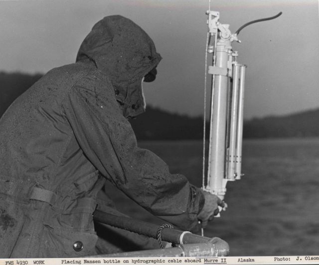 Placing a Nansen bottle on the wire aboard the MURRE II. Picture