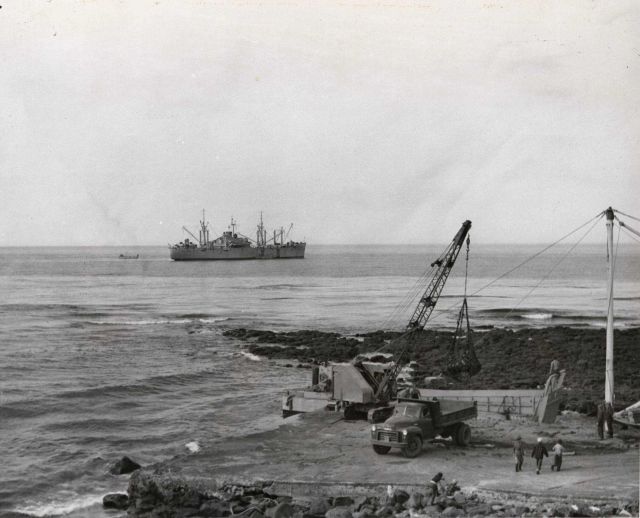 Unloading annual supply ship at St Picture