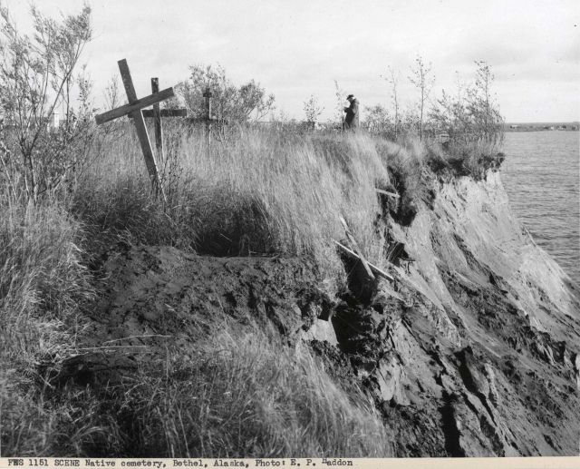 Portions of the Bethel cemetery eroding into the Kuskokwim River. Picture