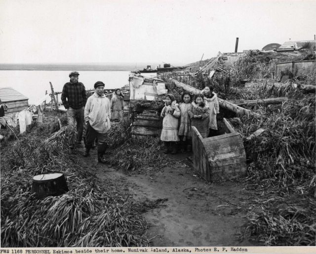 Eskimo family beside their home Picture