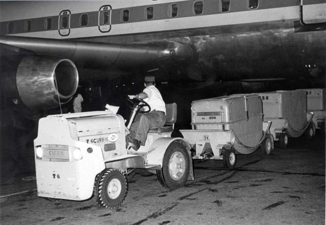 Loading fresh packed salmon in the cargo bay of a commercial airliner. Picture