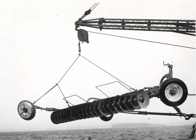 Underwater plow, used in control of oyster predators, ready to be lowered. Picture