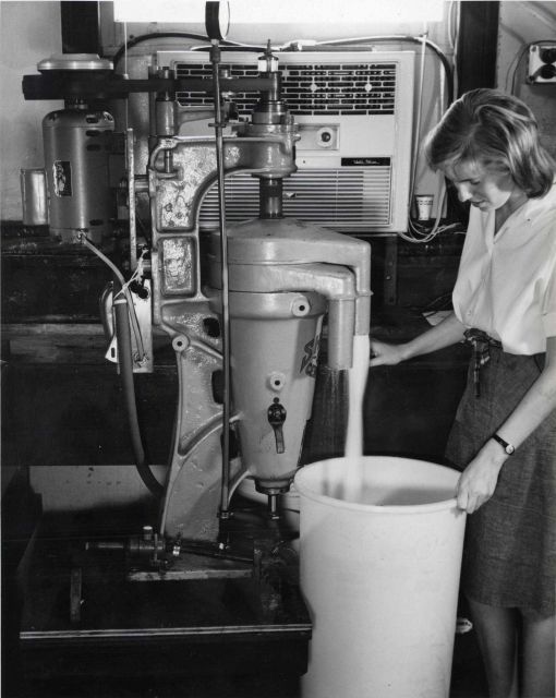 National Science Foundation intern, Susan Wolshina, collecting centrifuged sea water for use in shellfish hatchery studies of bivalve larvae developme Picture