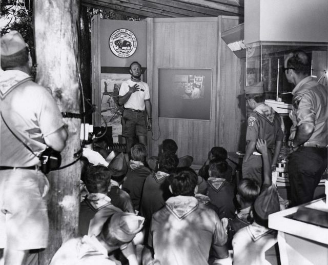 BCF representative discussing BCF display at 7th National Boy Scout Jamboree. Picture