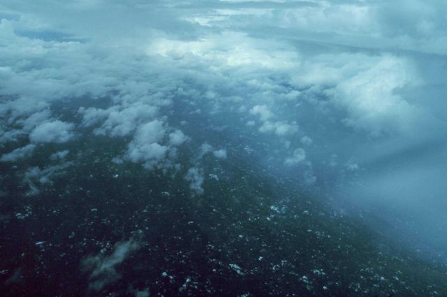 60 nautical miles east of the center of Hurricane Belle looking north. Picture