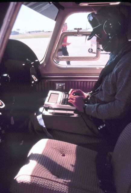 Lieutenant Dane Vose preparing for a snow survey background radiation collection flight. Picture