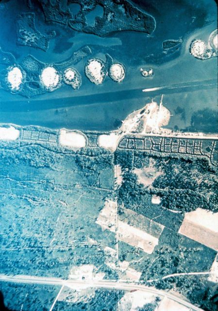 Dredged channel with apparent man-made islands from dredge spoils. Picture