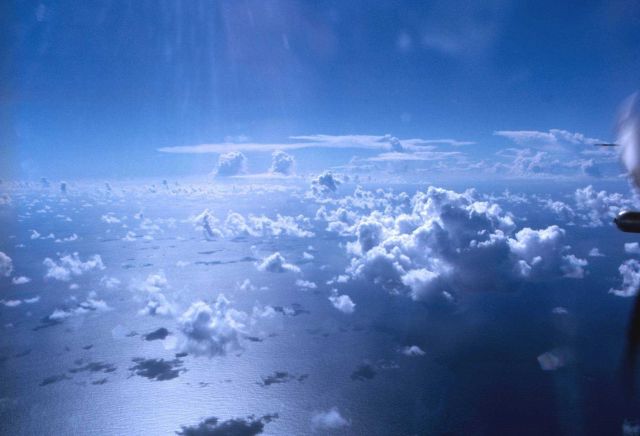 Cumulus and afternoon sun glint Picture
