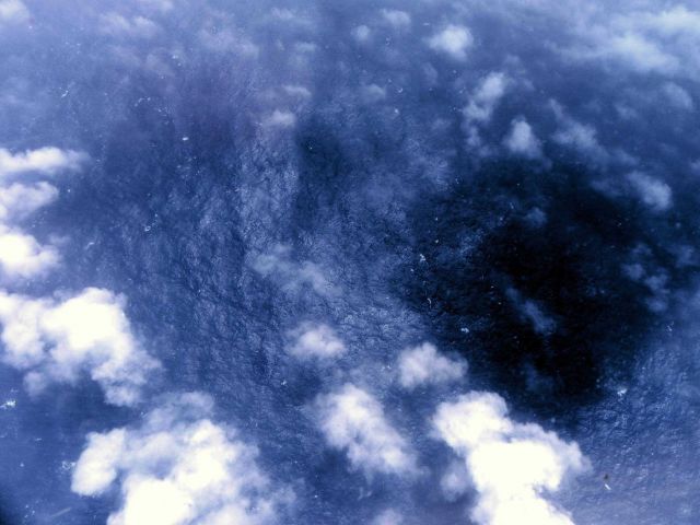 Sea surface in Hurricane Edouard seen from 8000 feet Picture