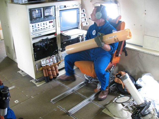 Joe Bosko preparing to launch bathythermograph sonobuoy. Picture